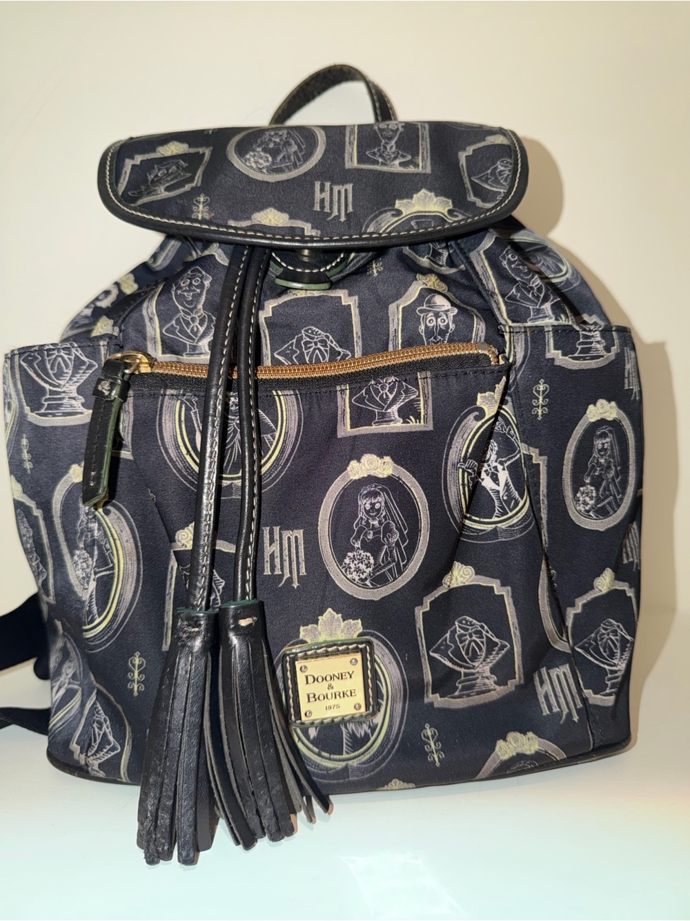 Dooney & Bourke Black Graphic Drawstring Backpack with Tassel Accents